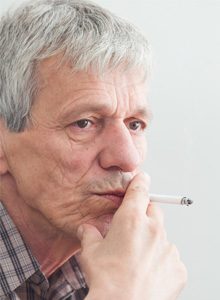 Smoking is not the only cause of lung cancer - elderly man smoking
