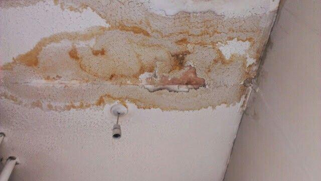 asbestos in the home - damaged asbestos ceiling