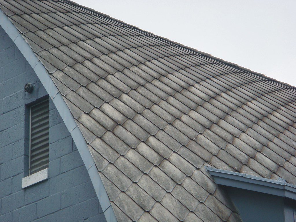 Asbestos cement roof shingles